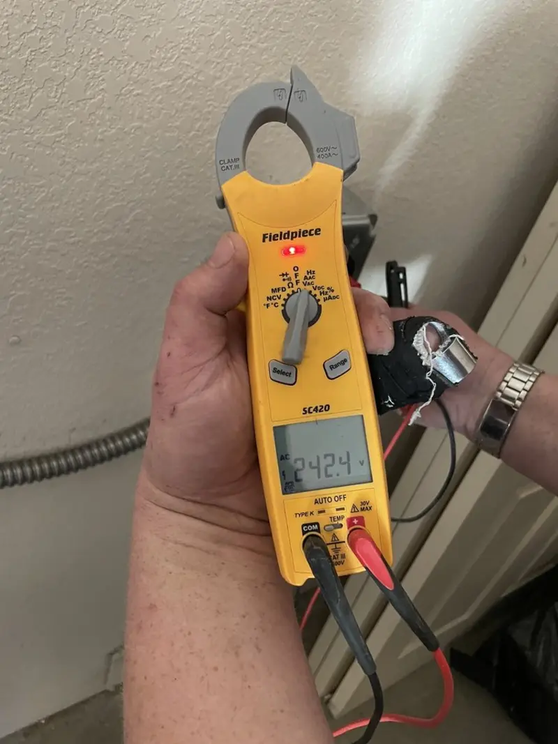 Voltage testing with clamp meter during Generator Installation in Canyon Lake